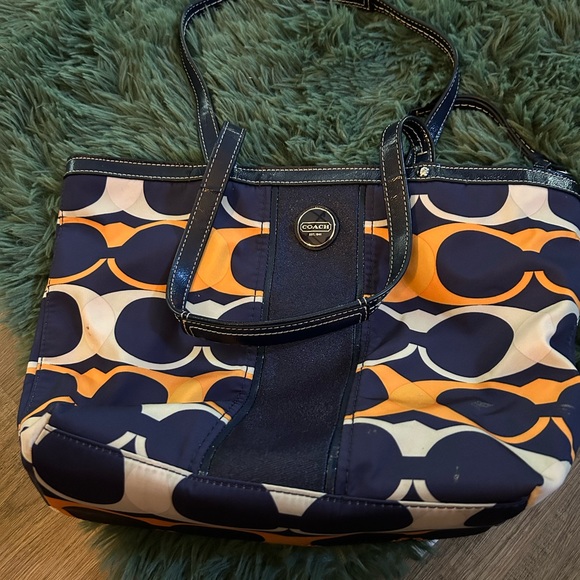 Coach purse, used and coach small clutch, new.  Misc purses wallet and I phone - Picture 1 of 4